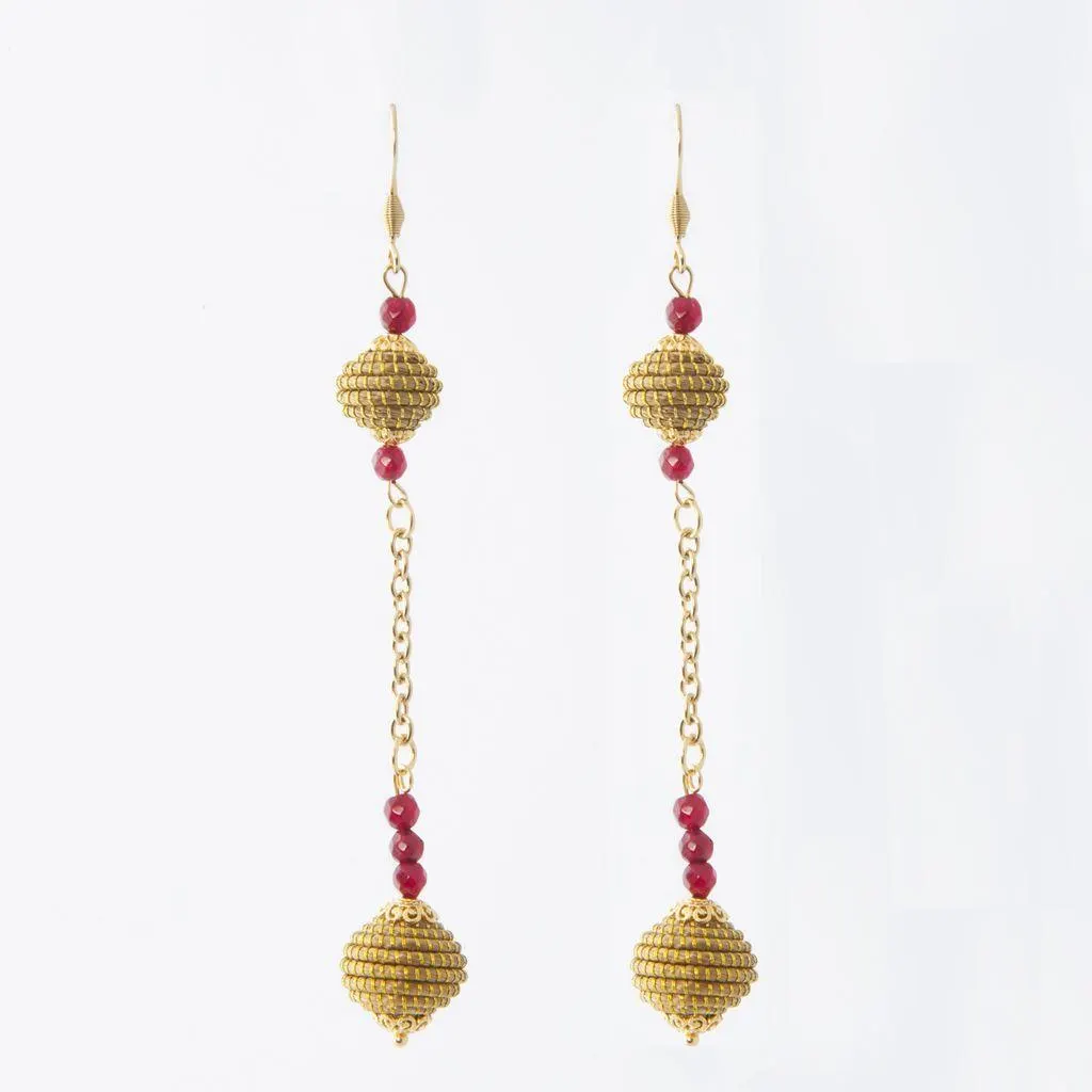 Isabel Earrings in Ruby — golden grass jewelry designed by Orit, handwoven in the Cerrado, Oroboros