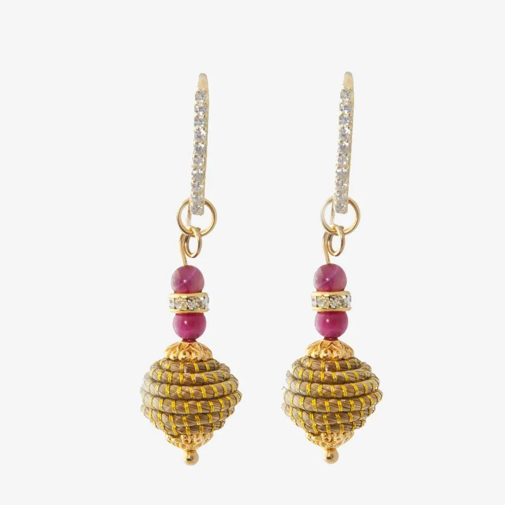 Uriel Earrings in Ruby — golden grass jewelry designed by Orit, handwoven in the Cerrado, Oroboros